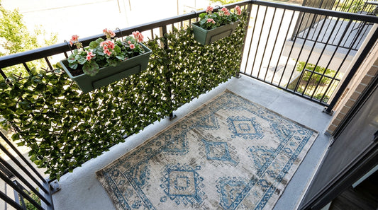 How to Style a Small Balcony with Rugs and Faux Greenery