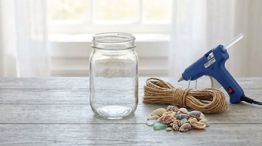 DIY Coastal Candle Holders Using Glass Jars, Rope, and Shell Accents